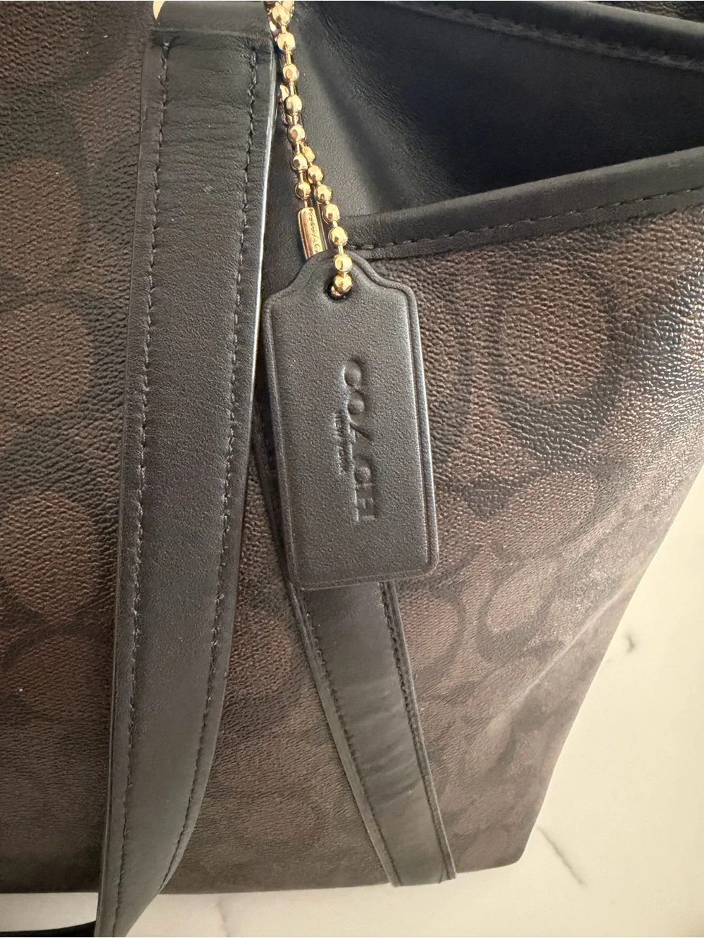 Coach Signature Diaper bag in Brown and Black